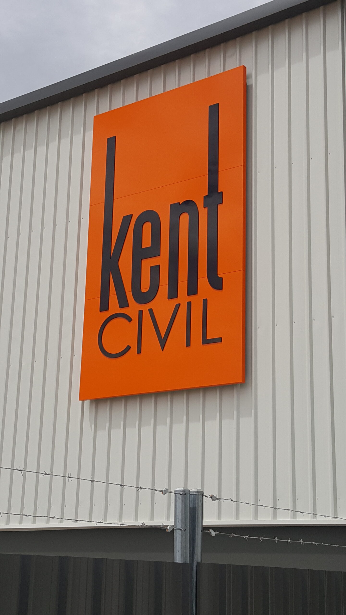 Featured image for “Kent Civil engineers custom outdoor sign strategy for new location.”