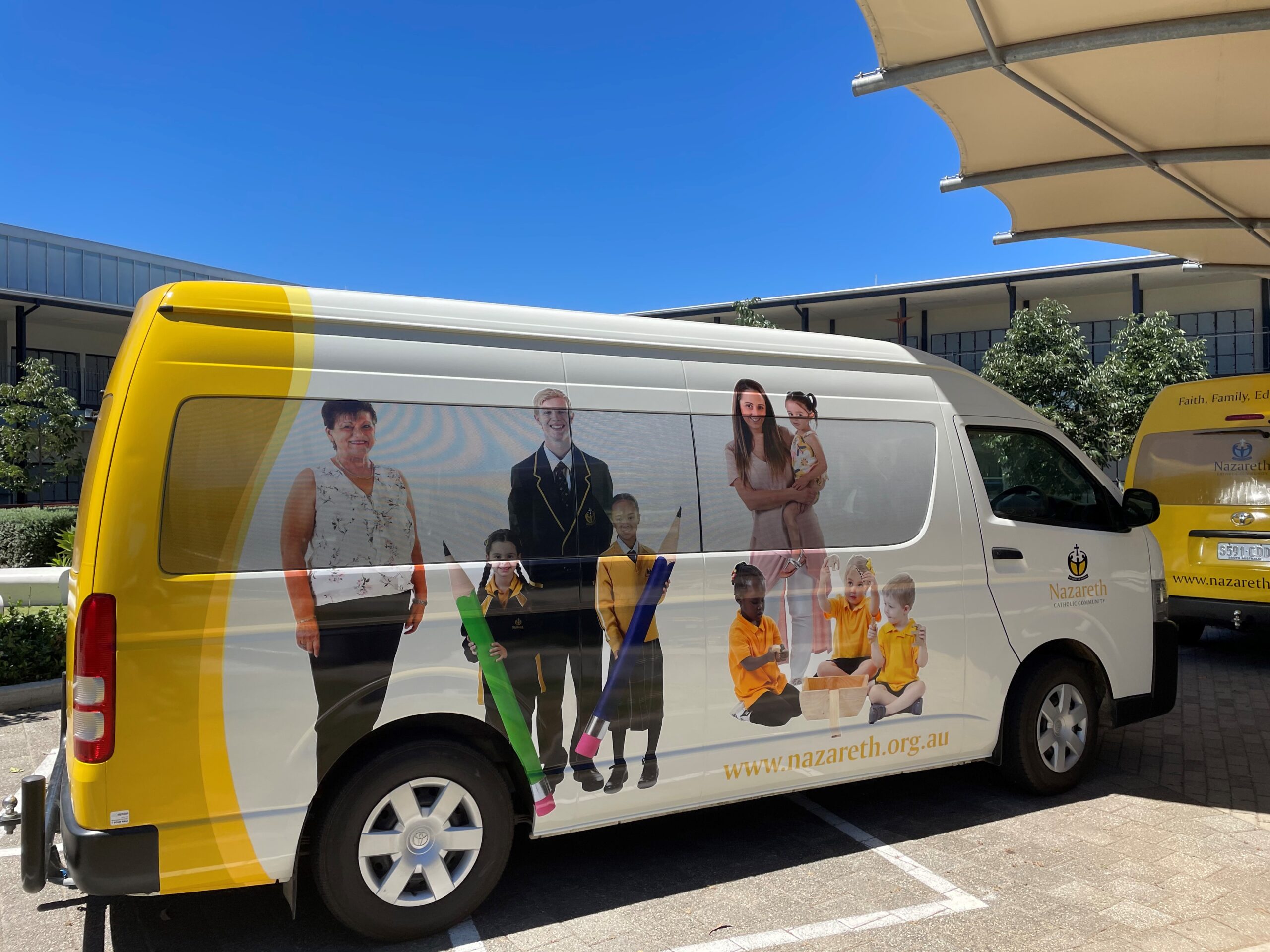 custom vehicle graphics and lettering on school bus Adelaide