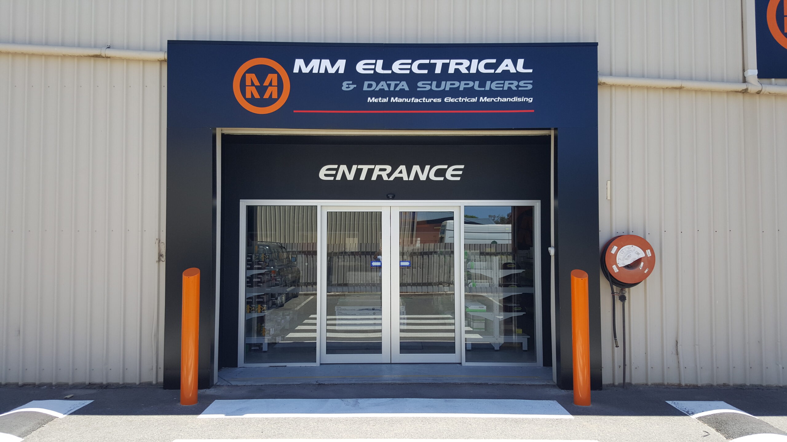 Featured image for “MM Electrical sparks new local presence with indoor and outdoor custom shop sign fit-out.”